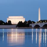 Monuments and Potomac River at night