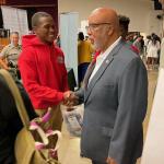 Congressman Thompson speaking with student at 2024 College & Career Fair