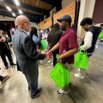 Congressman Thompson speaking with student at 2024 College & Career Fair