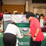 College and career fair attendees at table