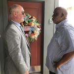 Congressman Bennie Thompson talking with man