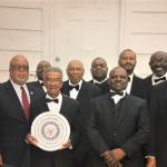 Congressman Bennie Thompson posing with group of men