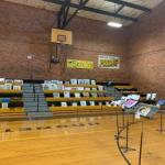 Gymnasium filled with art competition submissions