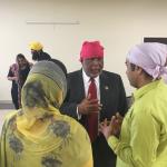 Congressman Bennie Thompson talking with man and woman