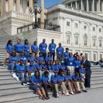 Congressman Bennie Thompson posing with Pyramid students